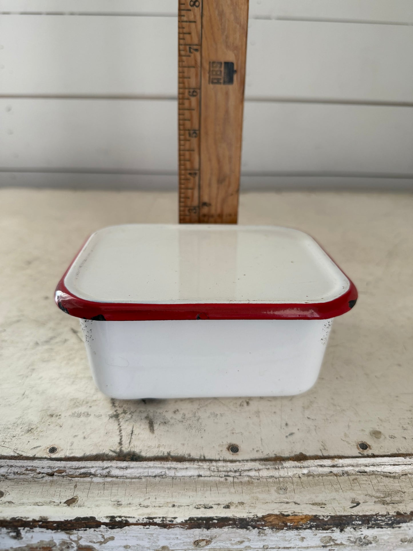 Red and white enamel Tin container