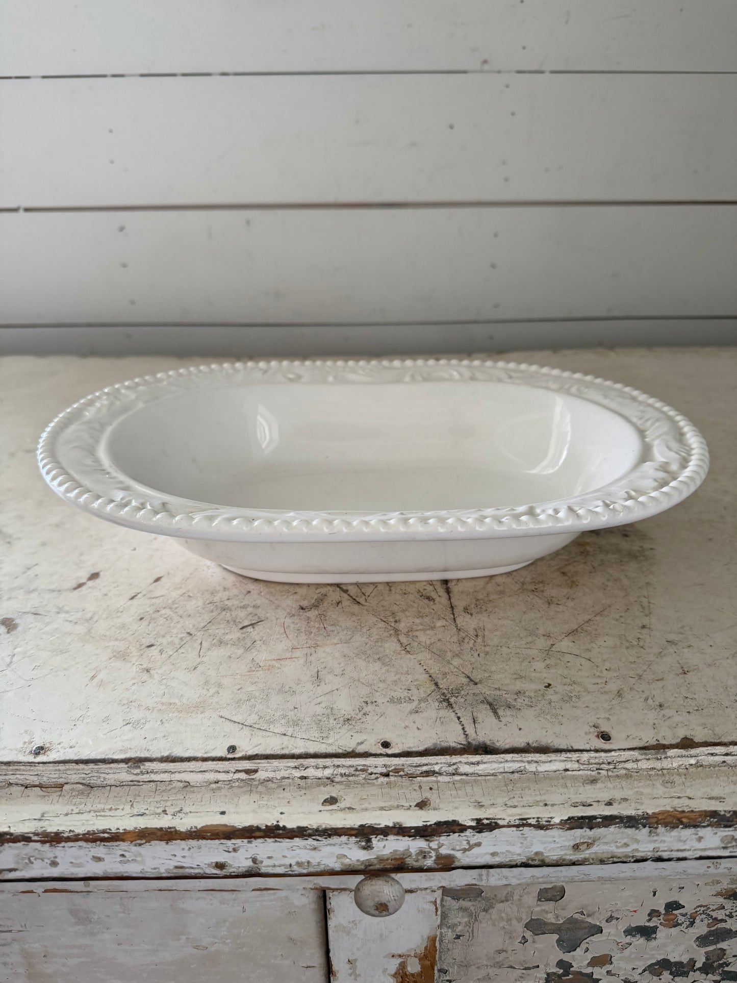 Vintage oval, ceramic serving dish made in Italy small chip