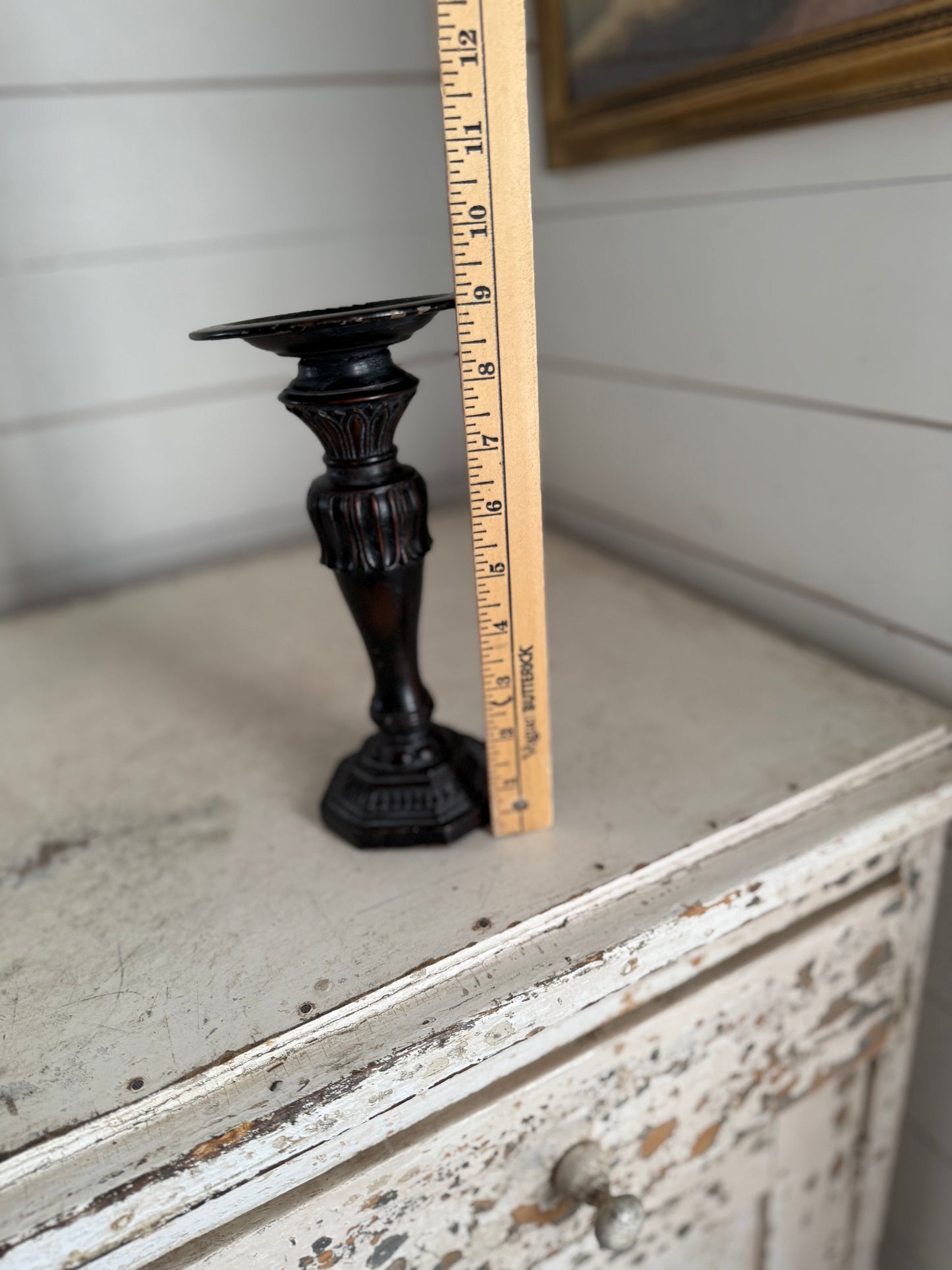 Black ornate candlestick will be painted