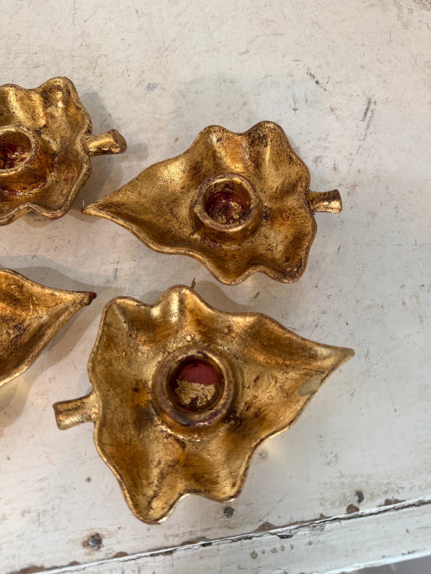Set of four Vietri Italian gold gilt leaf-shaped candle holders