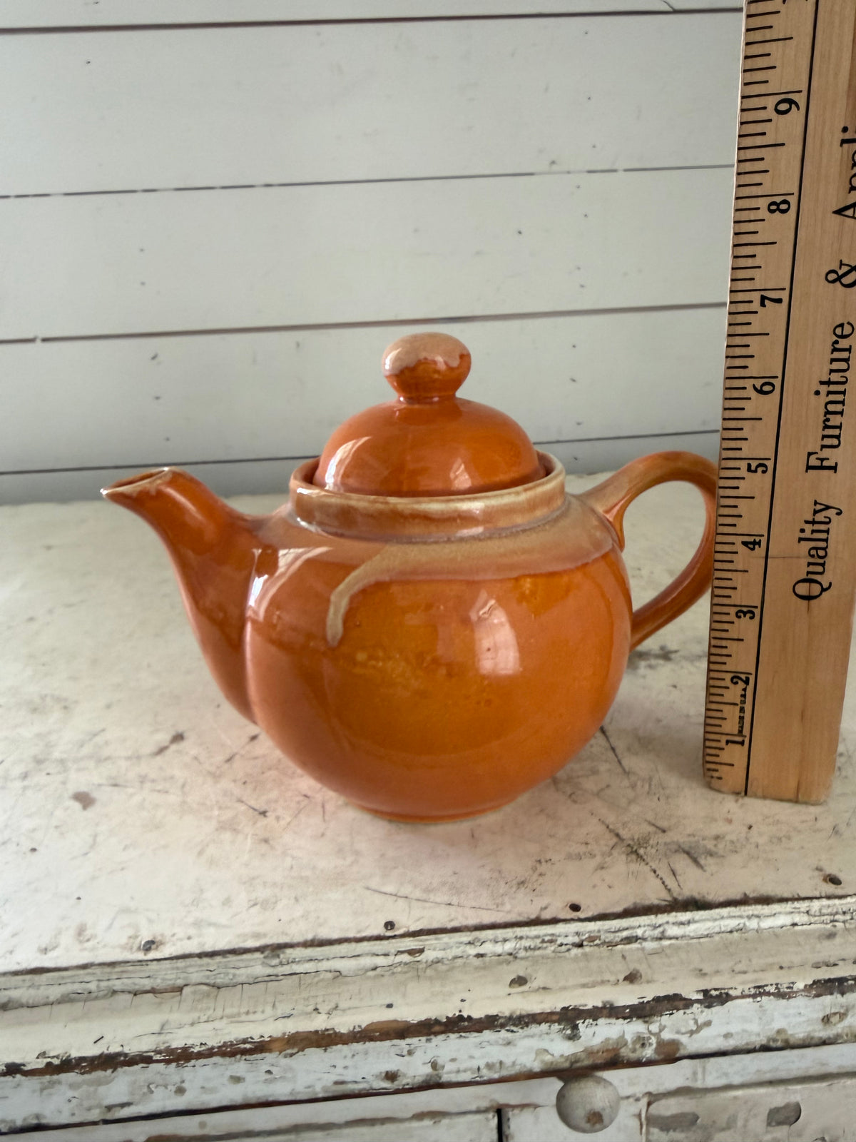 Ceramic orange glazed tea pot has some chip under lid - Madd in Japan