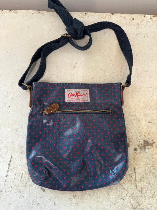 Cath Kidston bag with a navy blue and red polka dot print
