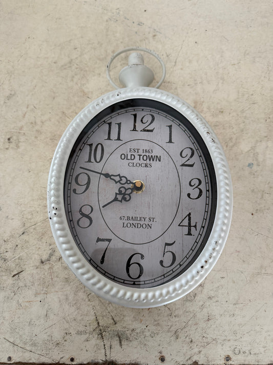 Small white Metal oval clock - will get makeover