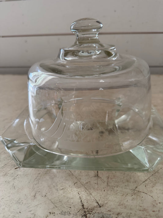 vintage glass dish with a domed lid, featuring a nautical clipper ship etched design