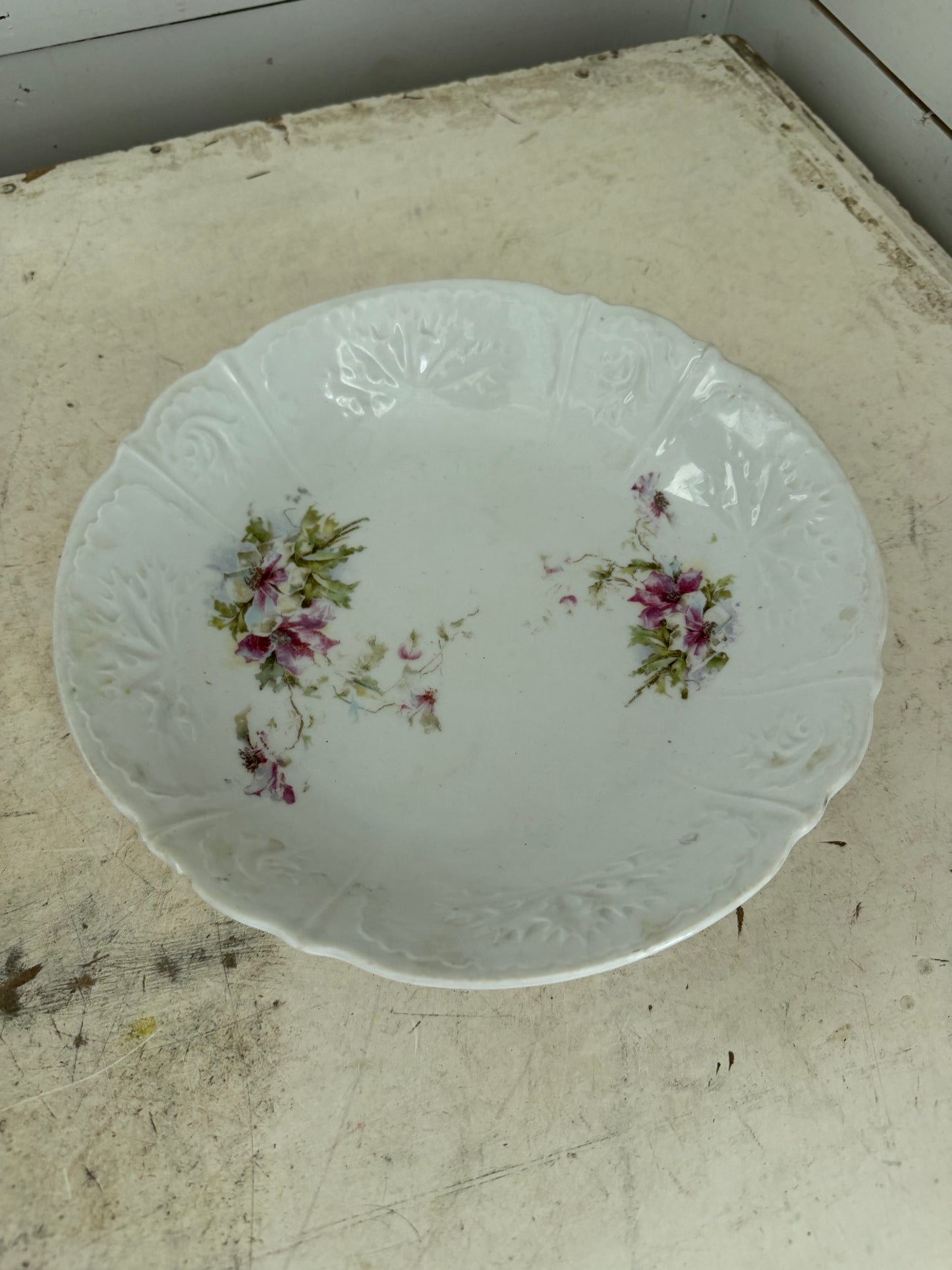 Antique hand painted bowl with small chip on bottom