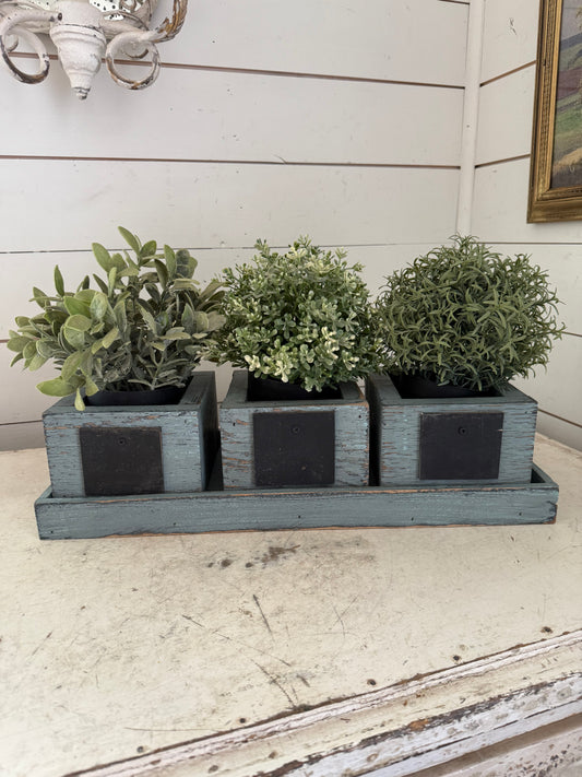 Set of three planters with tray floral not included