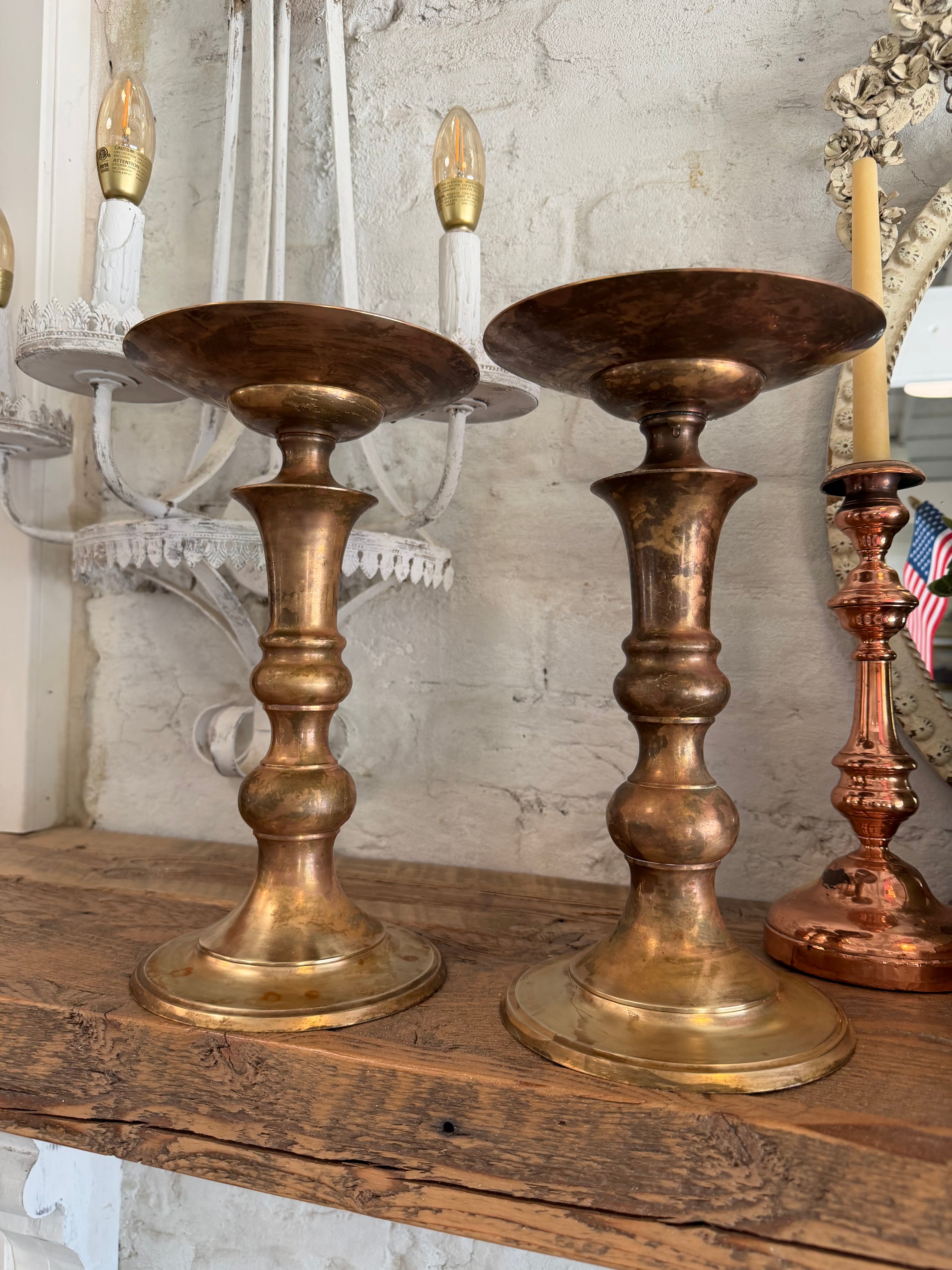 Large oversized pair of copper and brass candle holders will get polished more