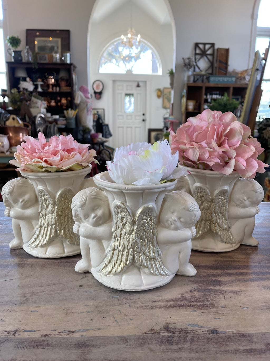 Cherub statue with Flower sold individually - as is
