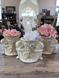 Cherub statue with Flower sold individually - as is