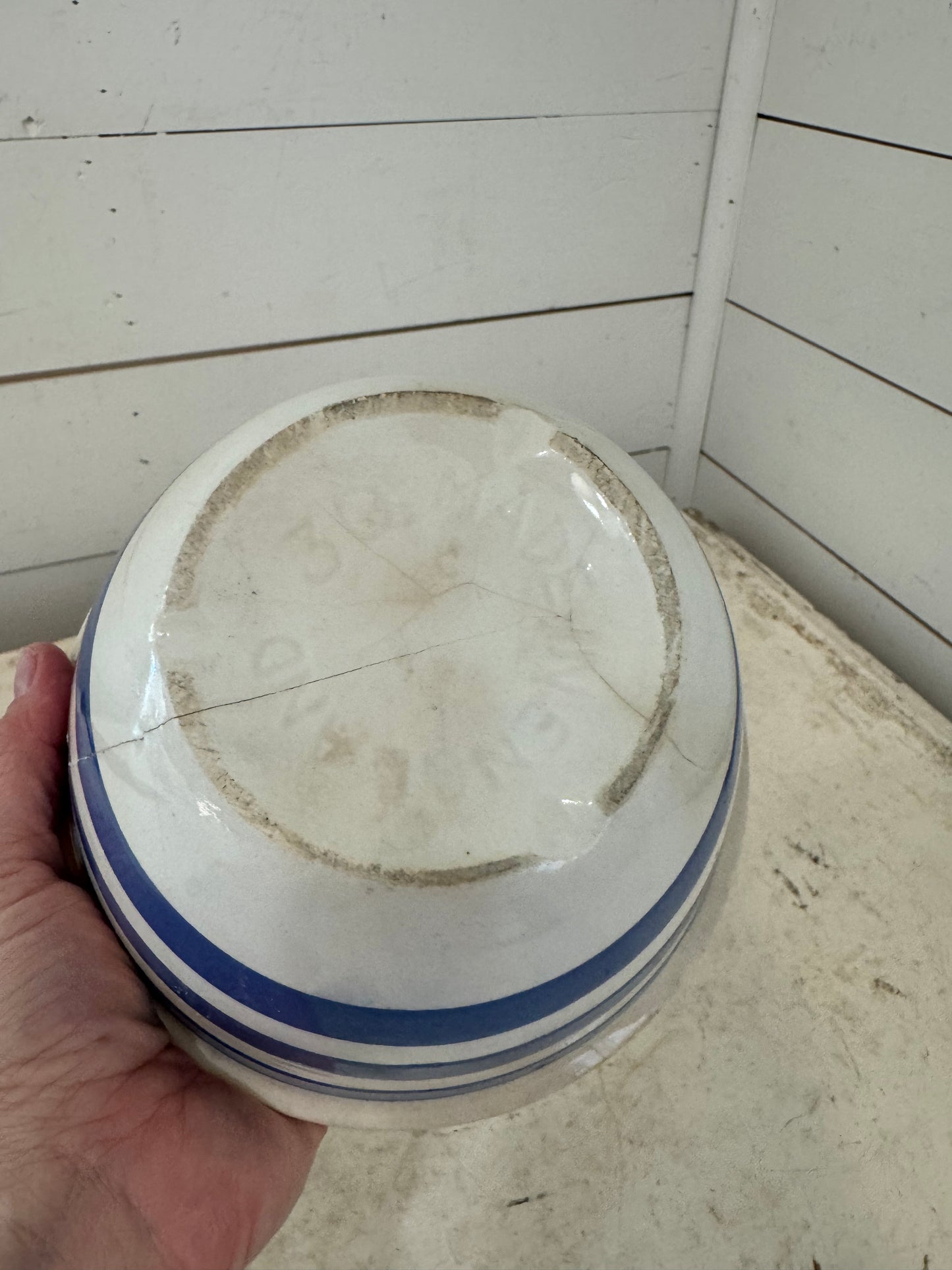 Antique blue stripe cornishware cracks have been repaired