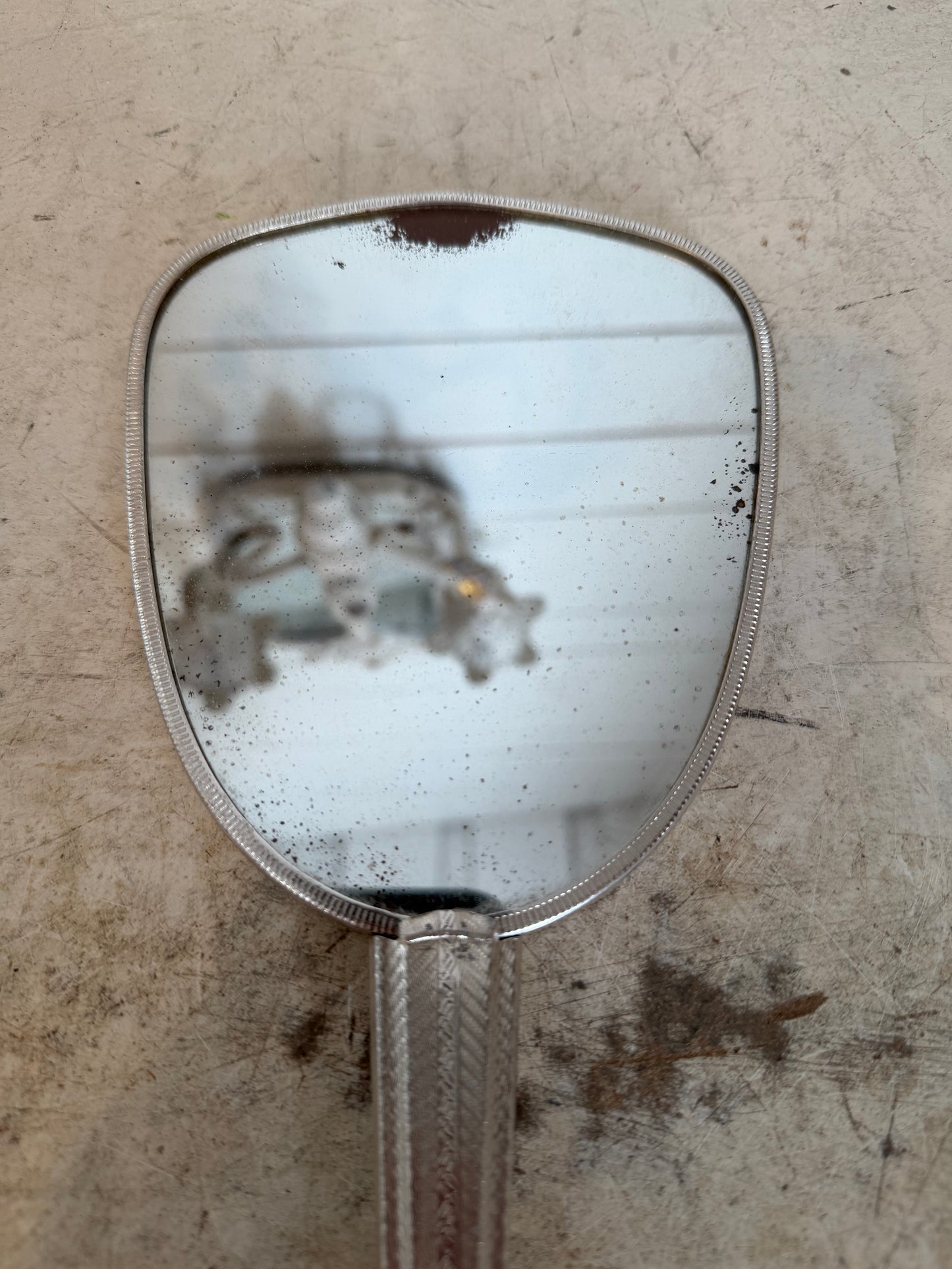 Vintage handheld vanity mirror, silver plated