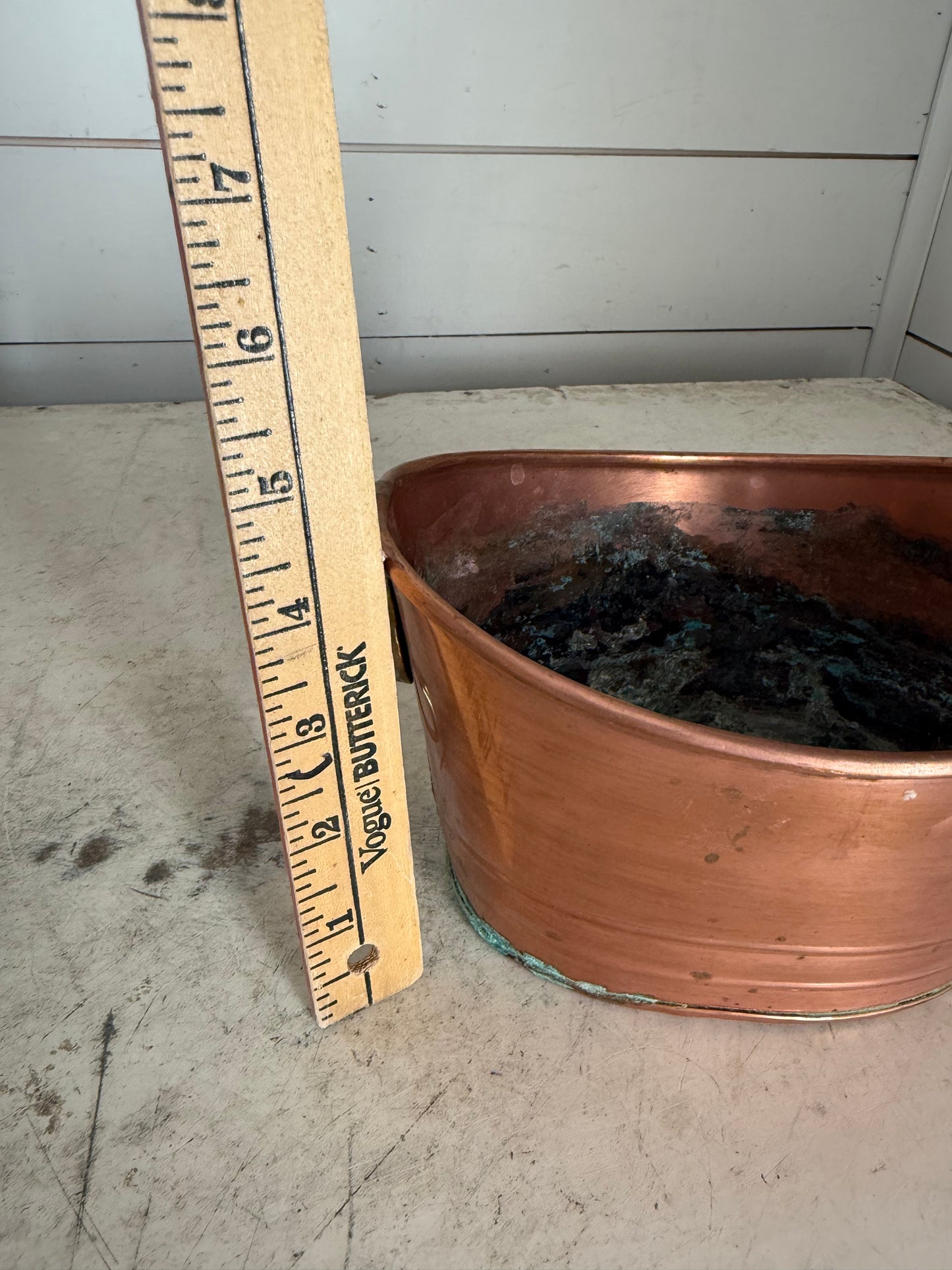 Vintage copper bucket with brass lion handles