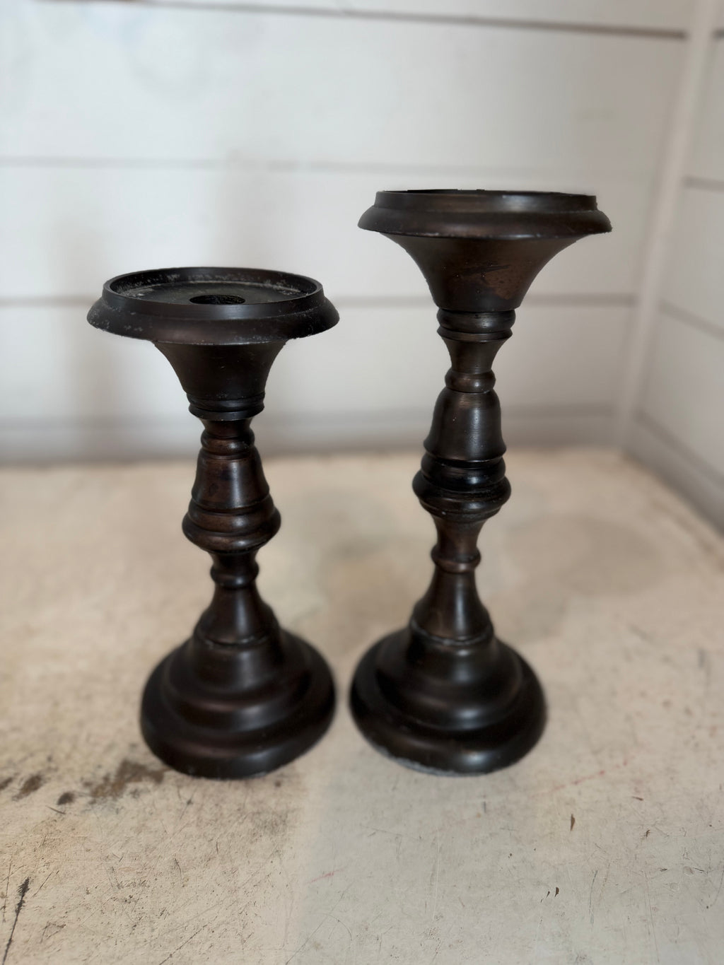 Set of metal bronze color candlesticks
