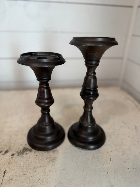 Set of metal bronze color candlesticks
