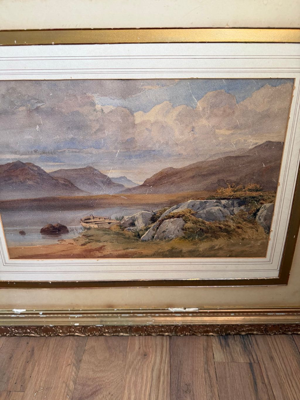 Gilded Frame antique 19th-century watercolor painting depicts a tranquil mountain lake scene, likely located in Scotland no glass