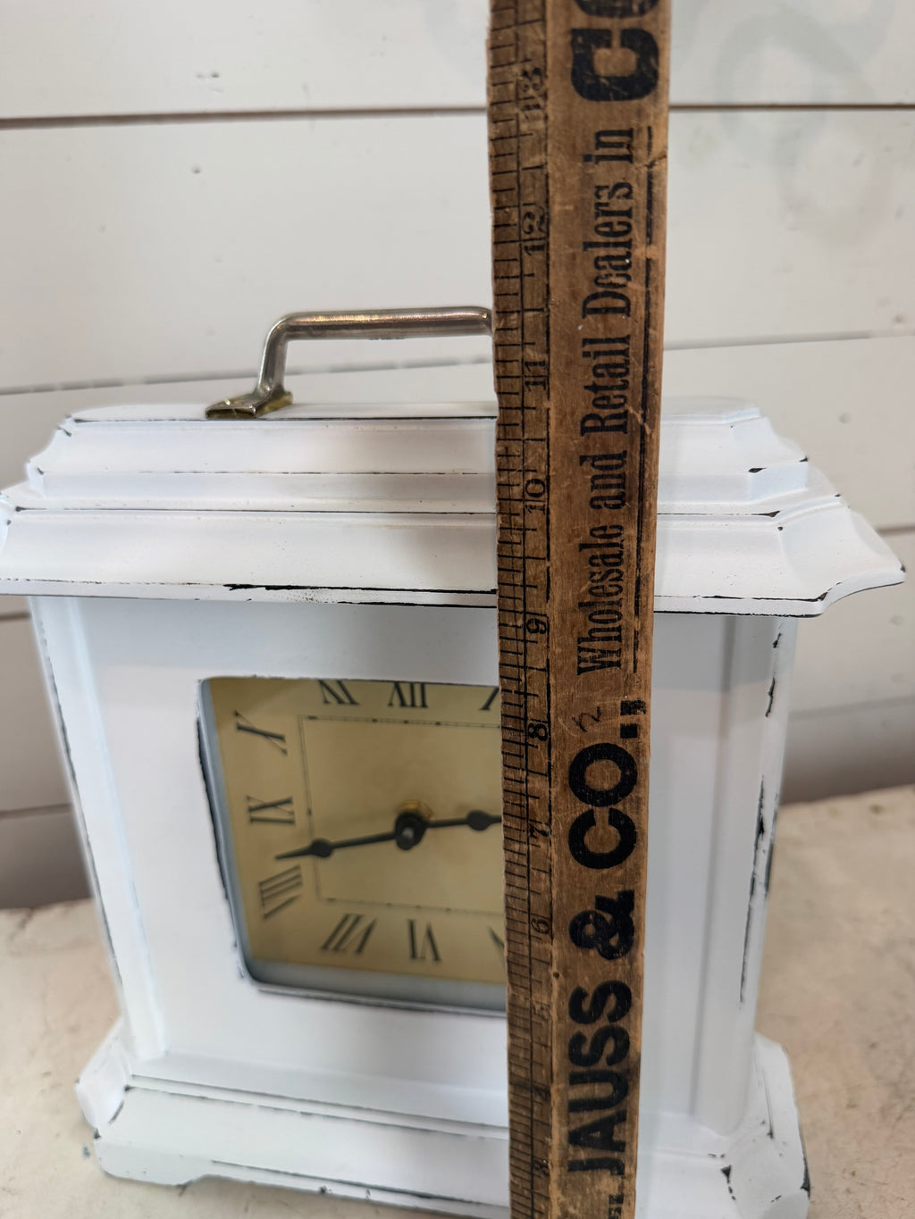 Hand-painted white clock with pull on top