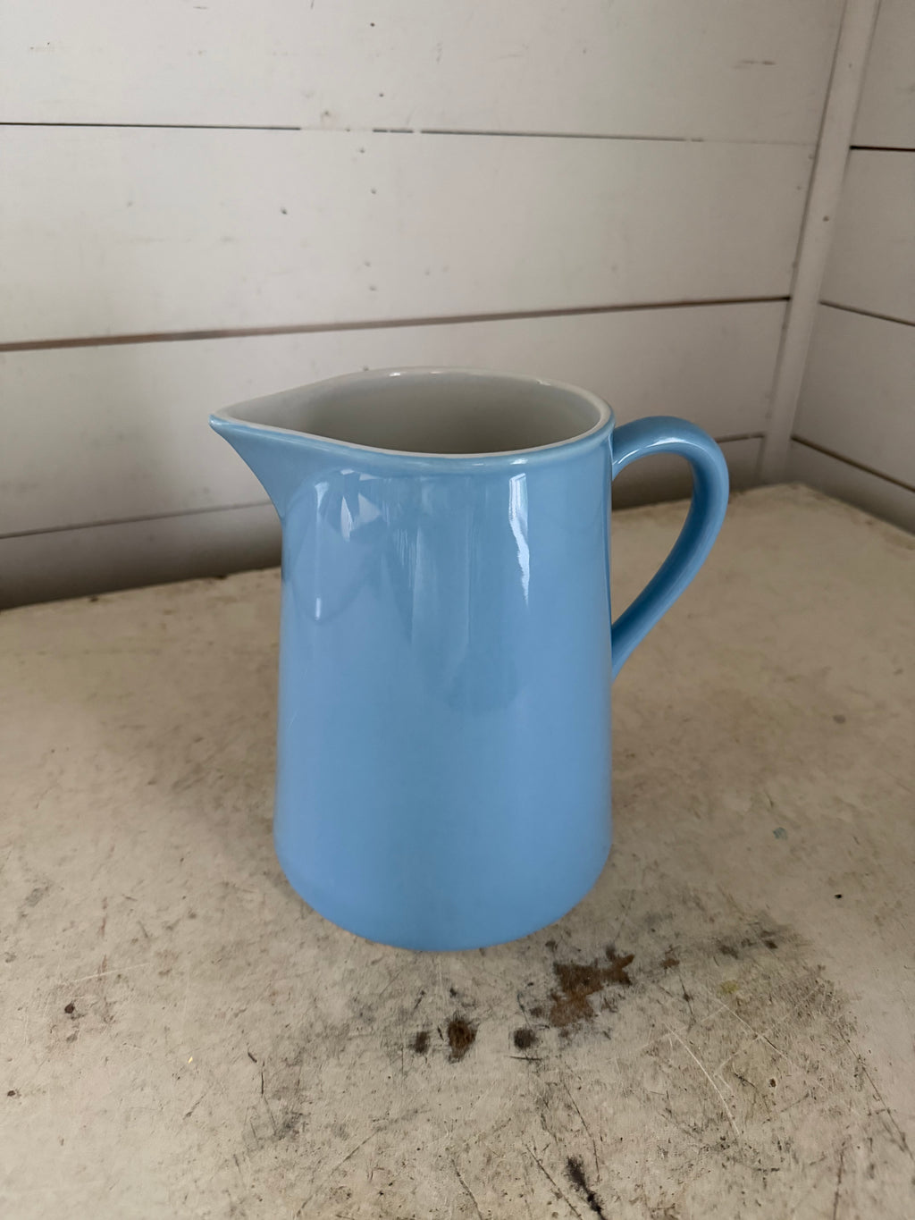 Cornflower blue ceramic pitcher