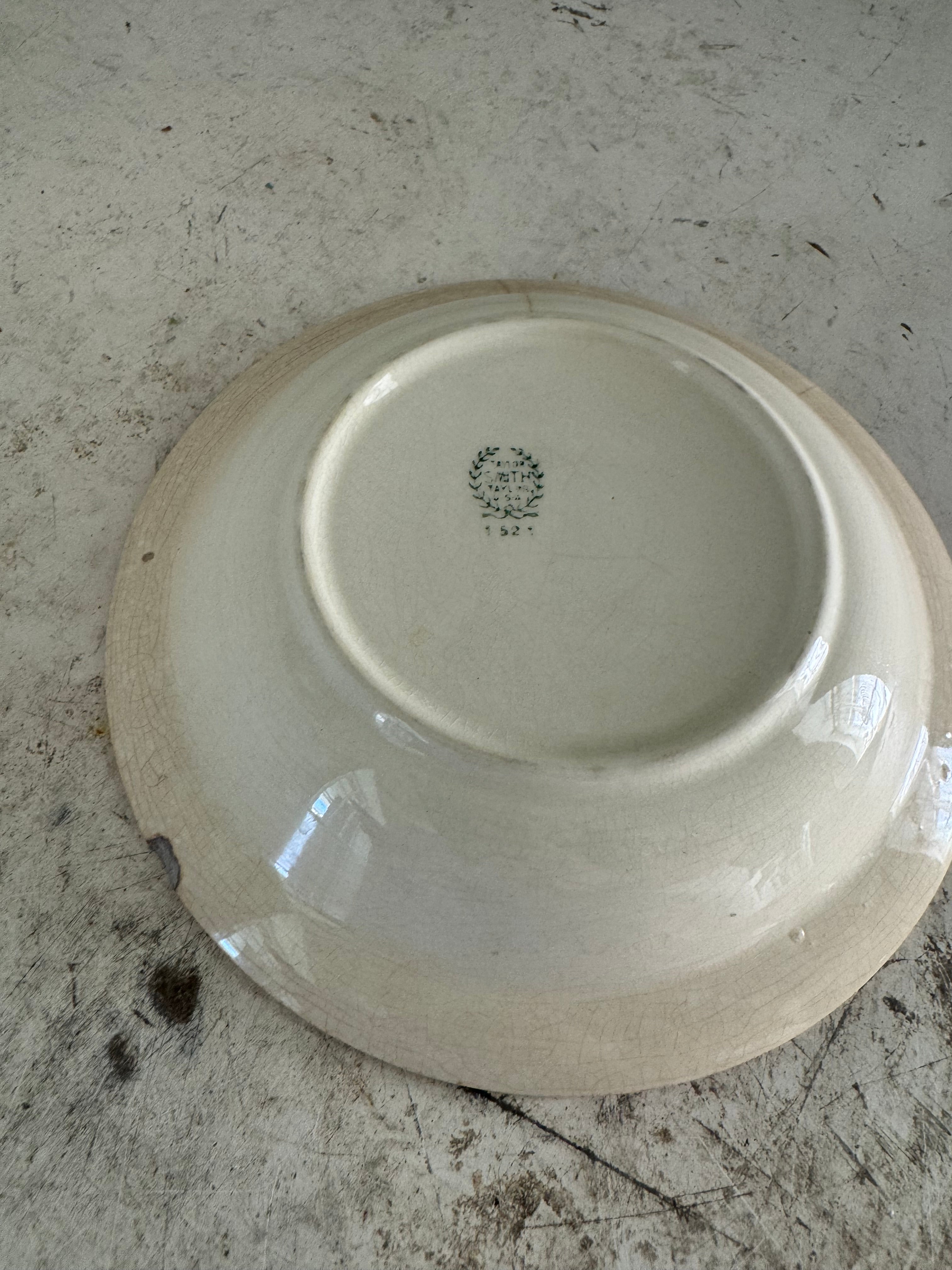 Taylor Smith bowl has chip and crack