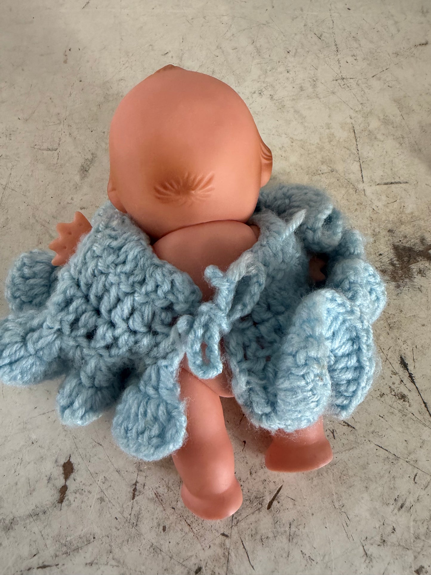 Kewpie doll with crochet dress