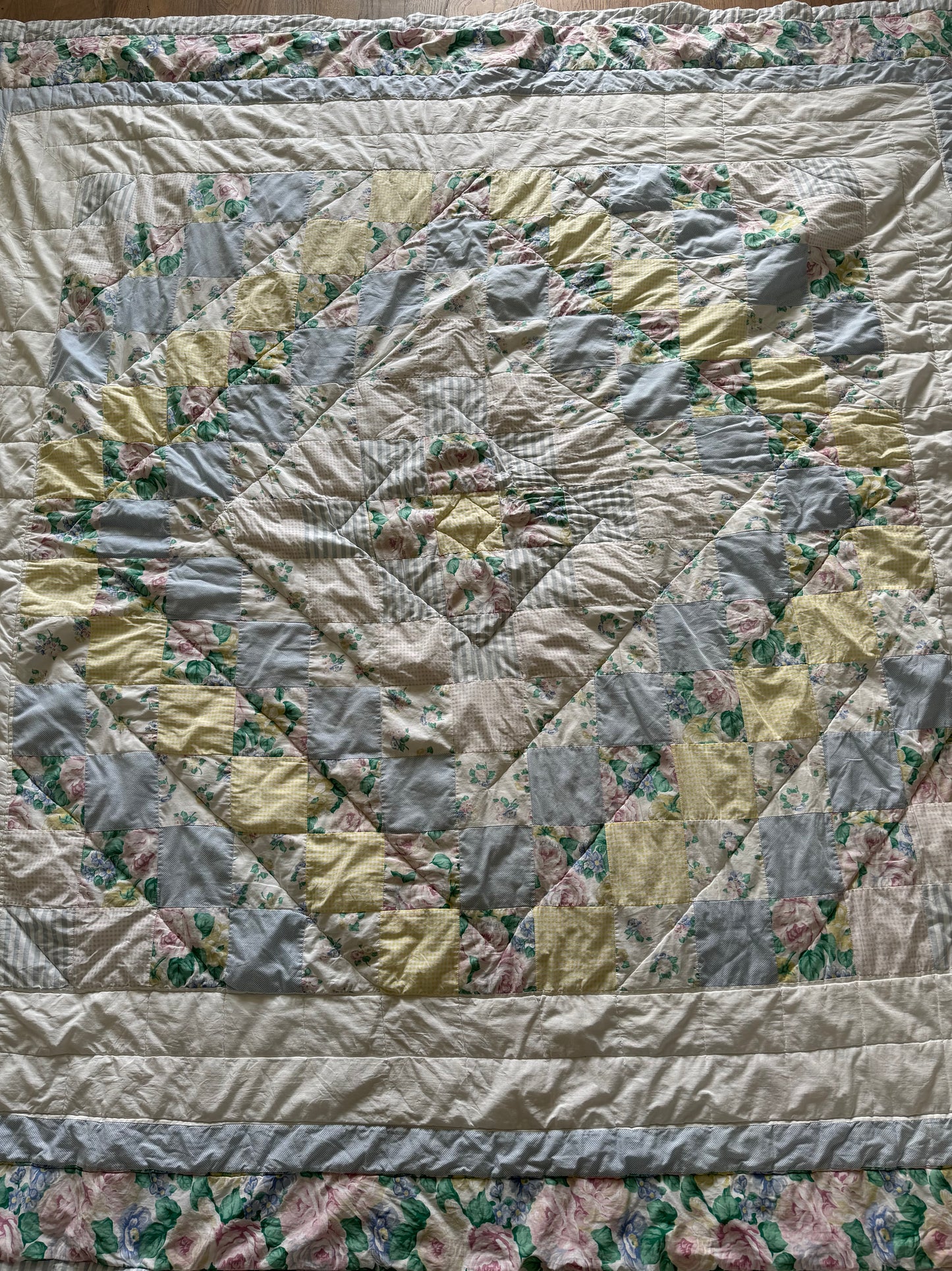 Full size pastel floral quilt