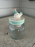 Ribbed jar with chicken lid