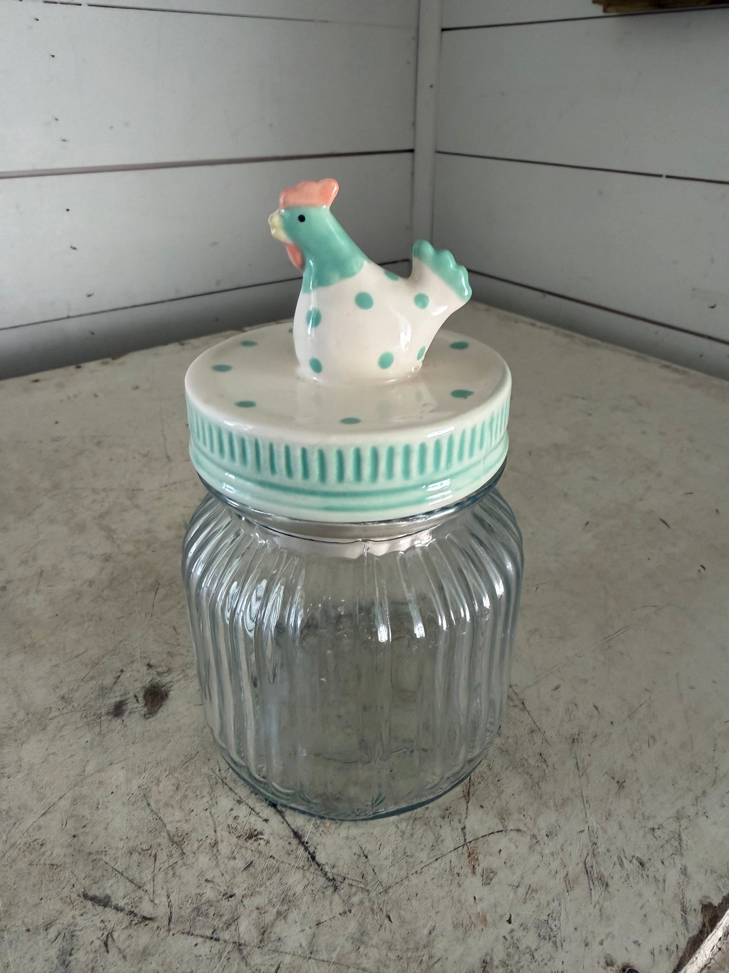 Ribbed jar with chicken lid
