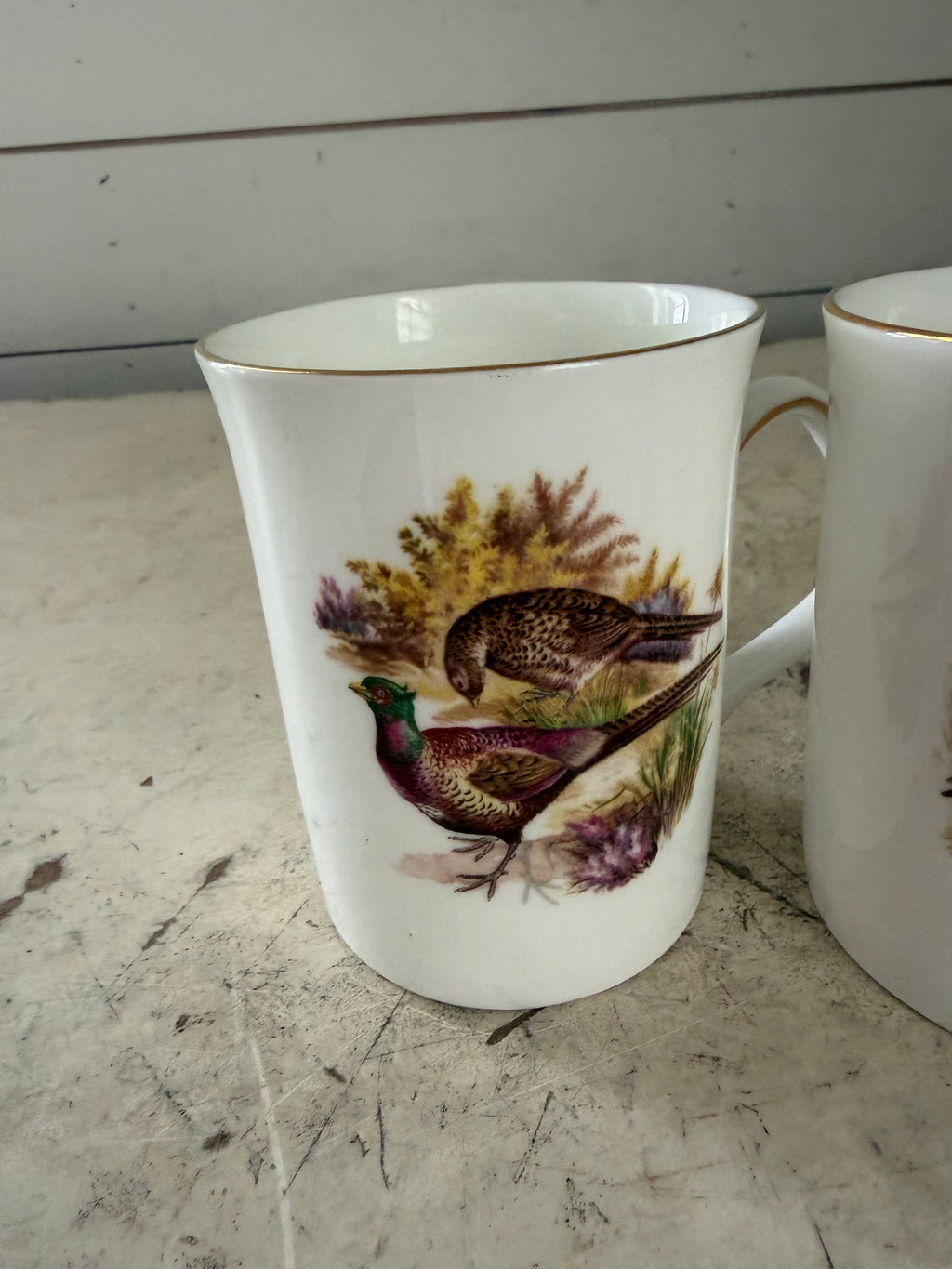 Set of bone China bird mugs