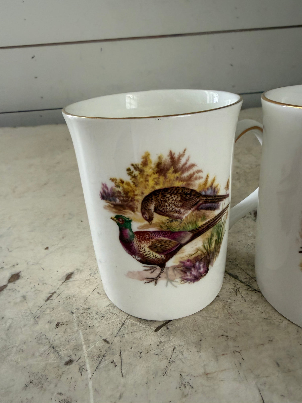 Set of bone China bird mugs