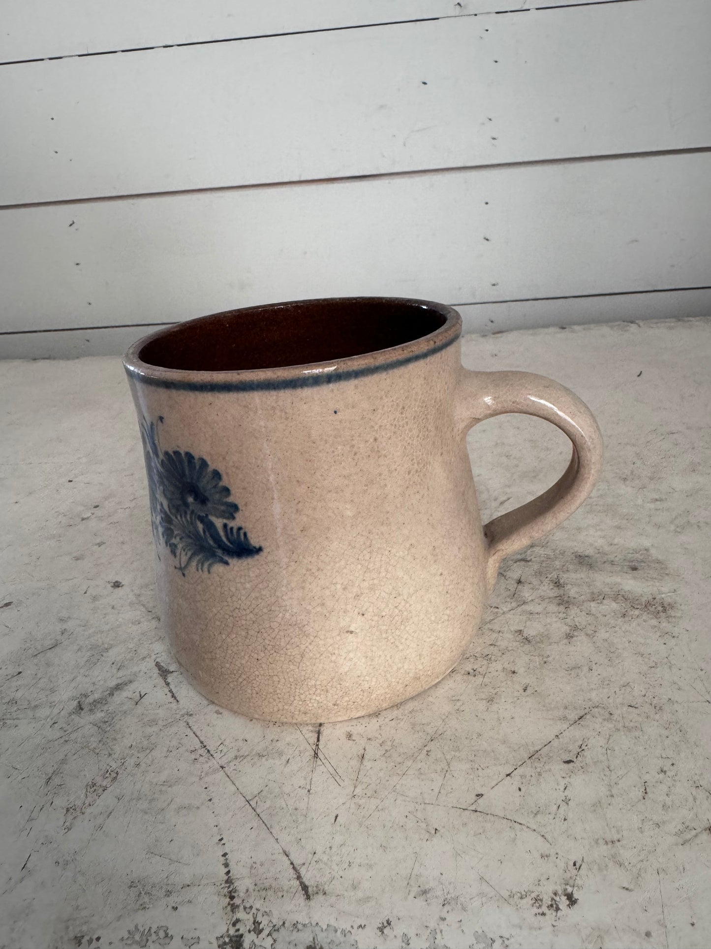 Antique blue floral print earthenware mug