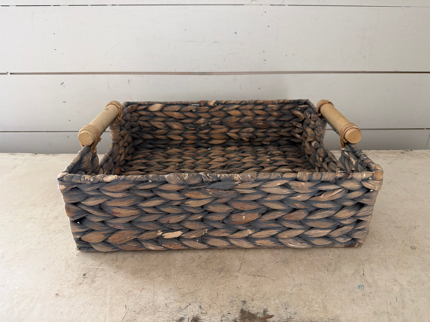 Woven basket with handles