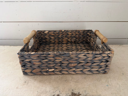 Woven basket with handles