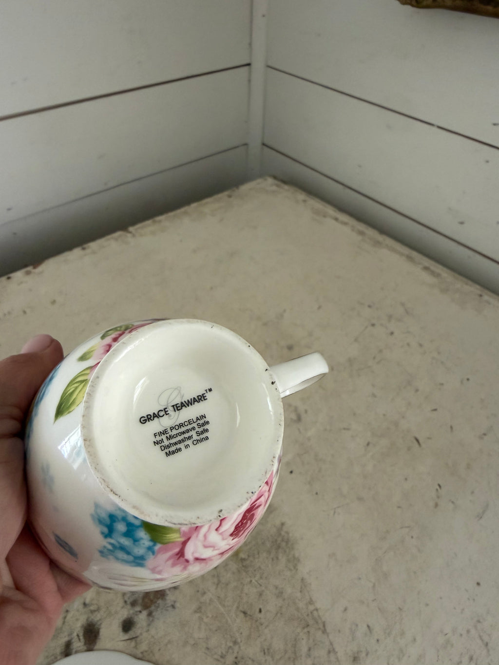 Mismatched, teacup, and saucer as is small chip