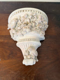 Plaster wall, sconces with flowers and birds will get makeover