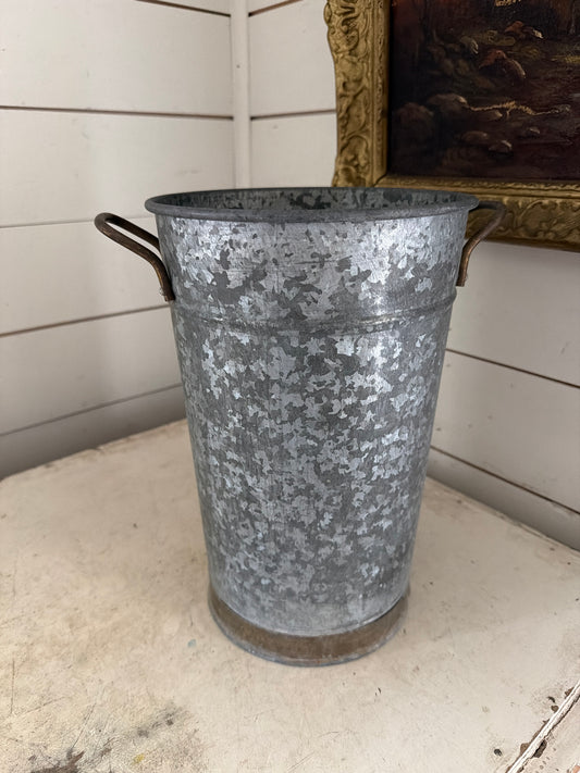 Galvanized bucket with brass handles and ring