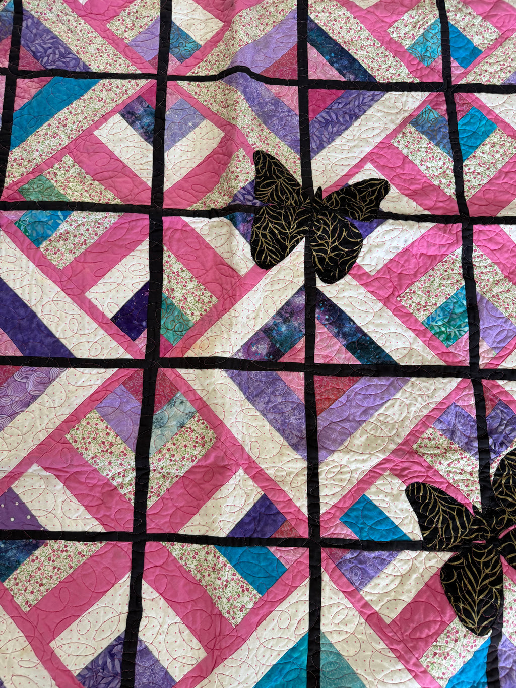 Handmade butterfly pieces quilt throw