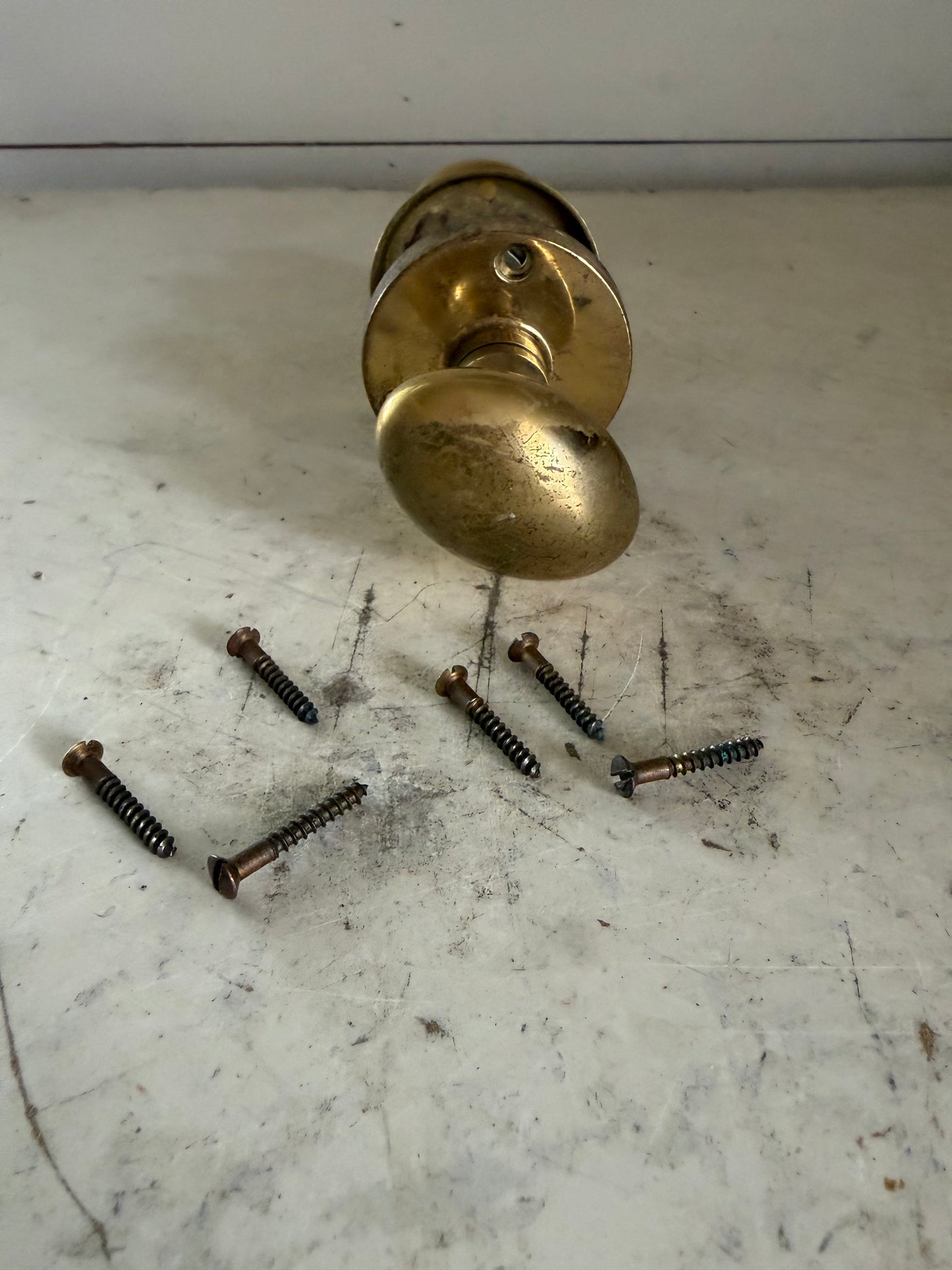 Edwardian Style Solid Brass doorknob with brass screws - one knob is round one is oval