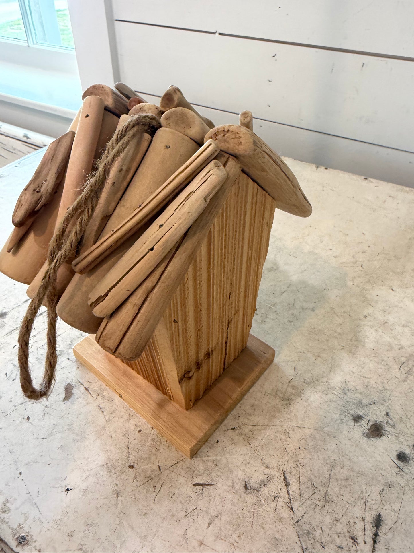 Rustic birdhouse with driftwood roof will get makeover