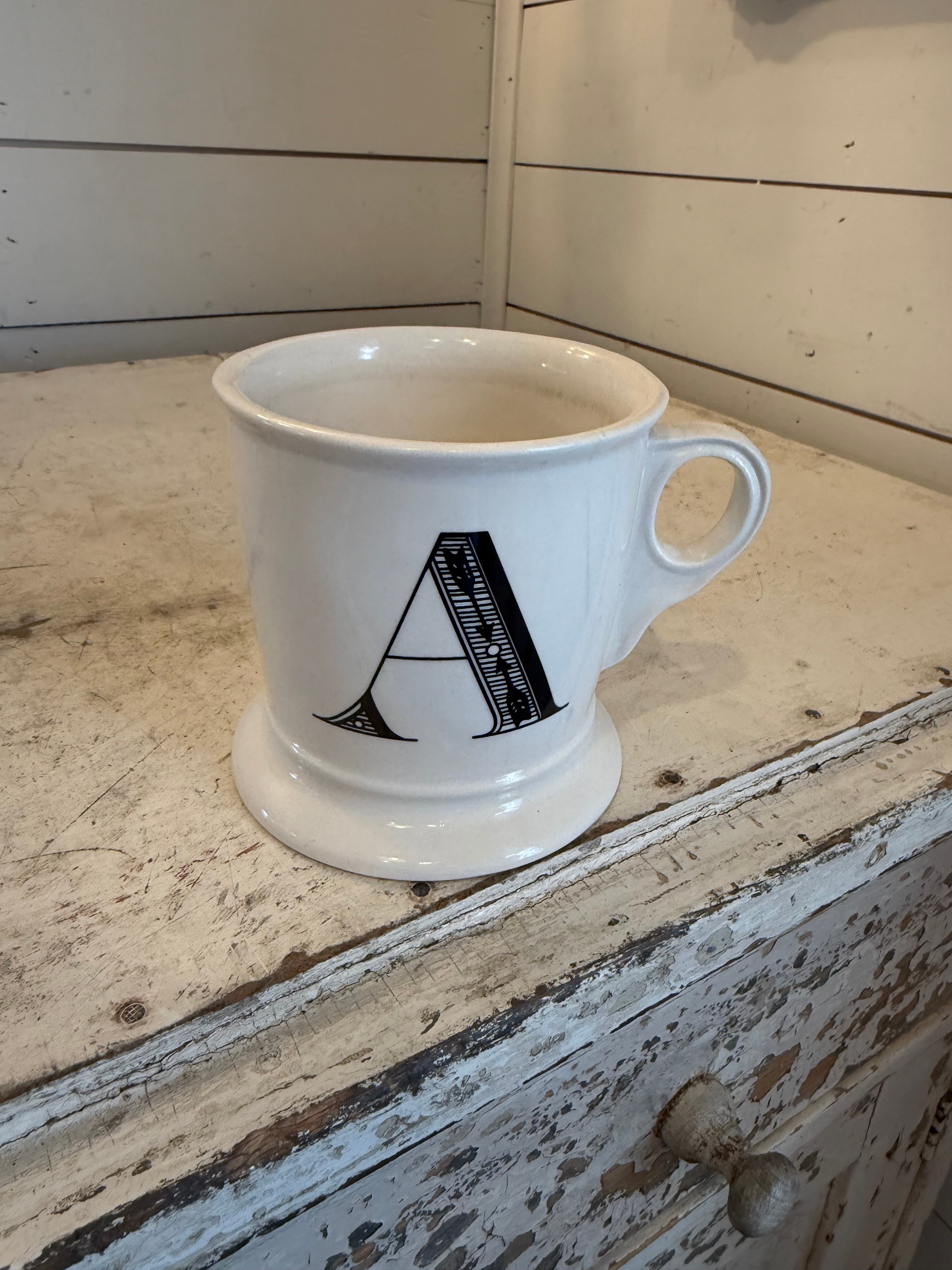 A Anthropologie Mug with crack in glaze