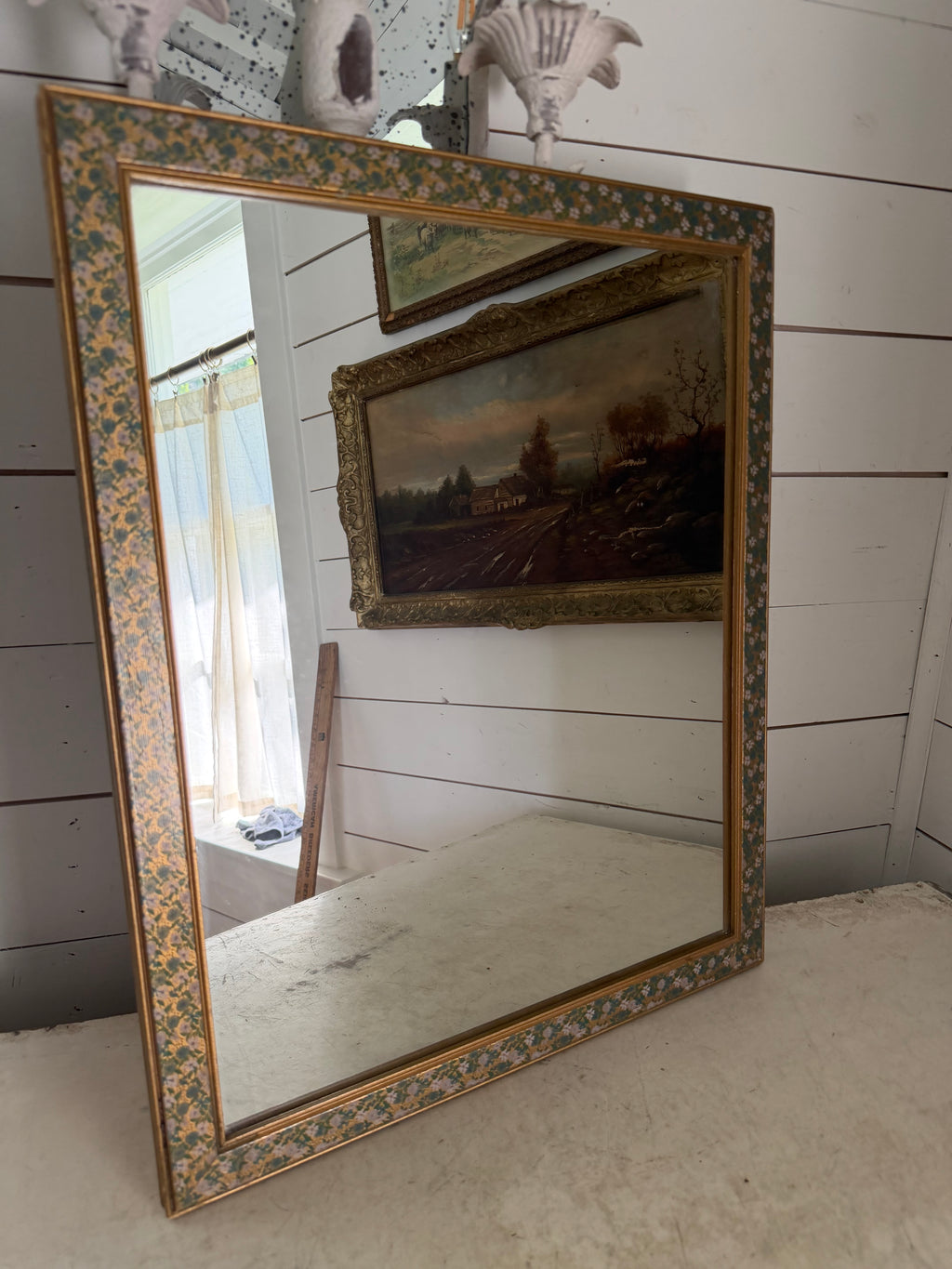 Floral framed mirror