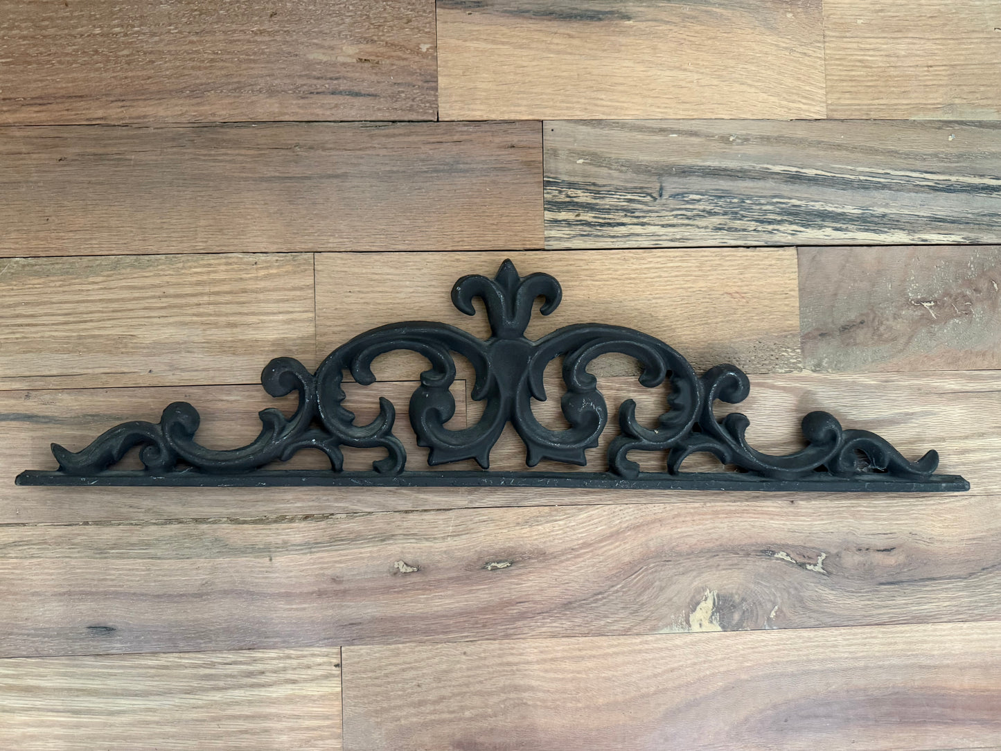 Cast iron ornate pediment