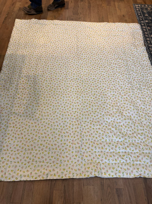 Vintage floral quilt has staining as shown full-size