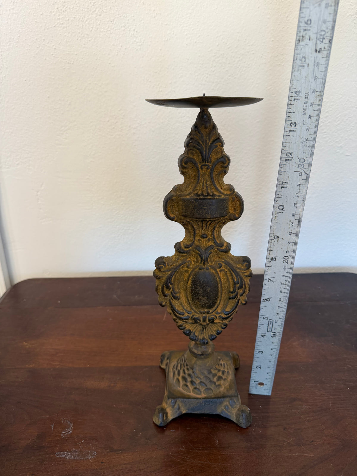 Baroque-style cast iron candlestick holder