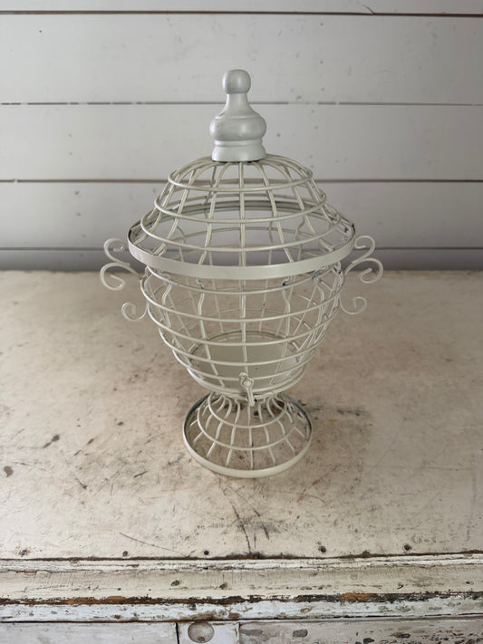 White decorative birdhouse style urn with lid