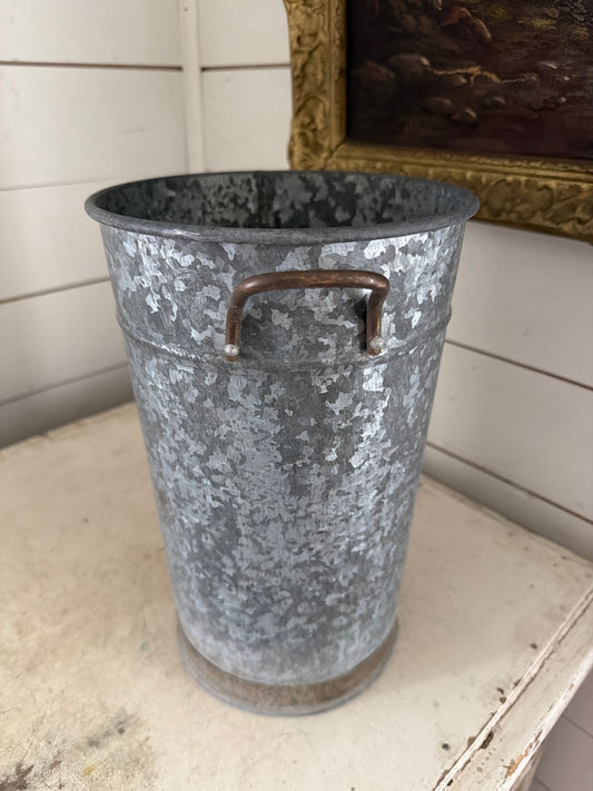 Galvanized bucket with brass handles and ring