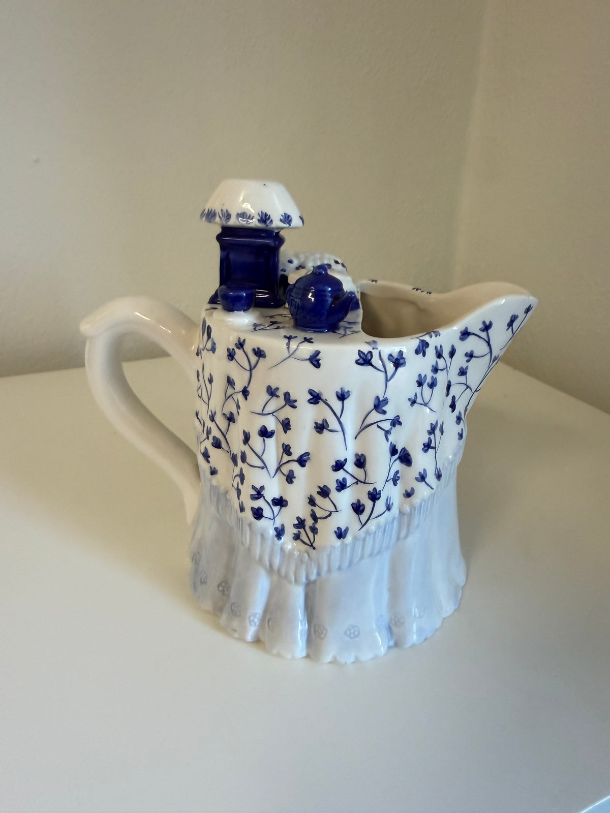 vintage blue and white ceramic pitcher