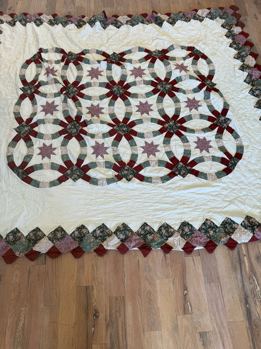Full/Queen Quilt with hand stitching has tears as shown