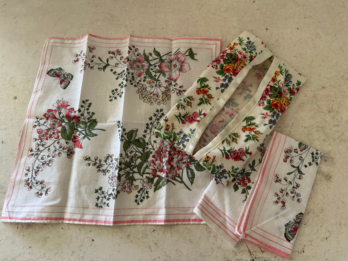 Set of three floral handkerchiefs and holder