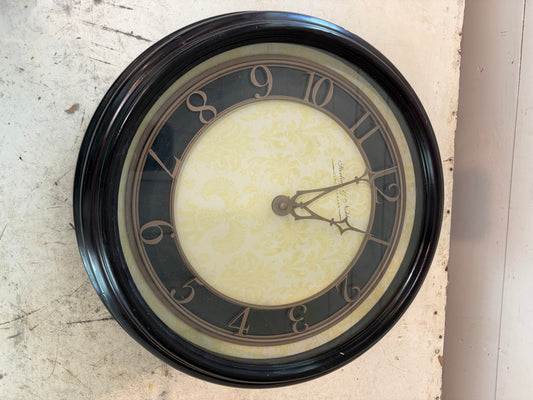 Round clock will have clock removed and get makeover with art