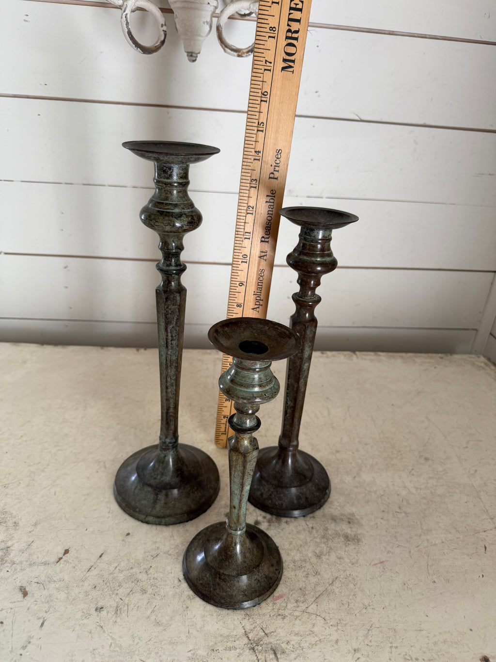 Antique solid, painted bronze, candlestick set of three