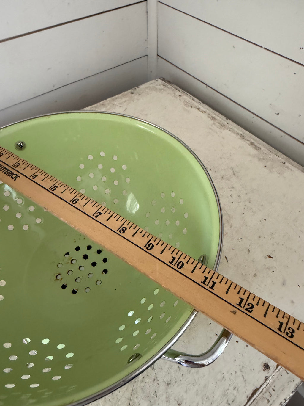 Green colander with handles